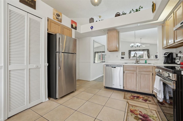 kitchen with sink, light brown cabinets, lofted ceiling, light tile patterned floors, and appliances with stainless steel finishes