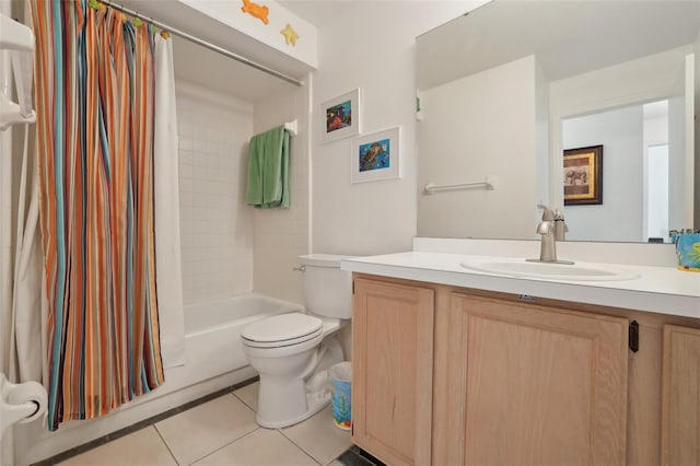 full bathroom featuring tile patterned flooring, vanity, toilet, and shower / bathtub combination with curtain