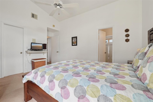 carpeted bedroom featuring vaulted ceiling and ceiling fan