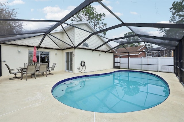 view of pool featuring a lanai and a patio area