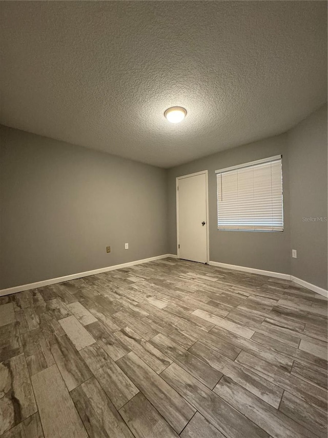 interior space featuring a textured ceiling