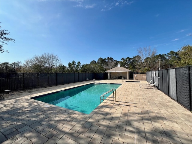 view of pool featuring a patio area