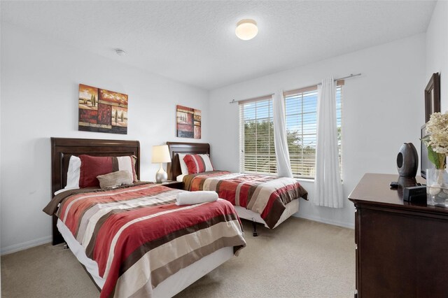 256 Lancaster Dr, Davenport, FL 33897 - bedroom with light carpet