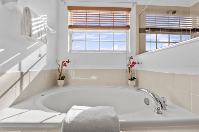 256 Lancaster Dr, Davenport, FL 33897 - full bath with healthy amount of natural light and a bath