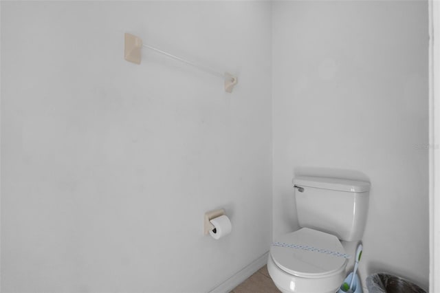 256 Lancaster Dr, Davenport, FL 33897 - bathroom with toilet and tile patterned flooring