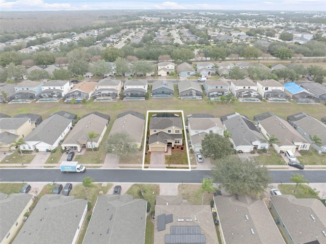 256 Lancaster Dr, Davenport, FL 33897 - aerial view of property and surrounding area featuring nearby suburban area and property parcel outlined