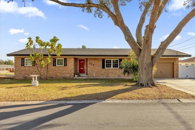 single story home with a garage and a front yard