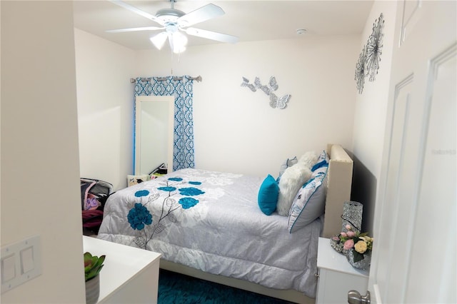 bedroom featuring ceiling fan