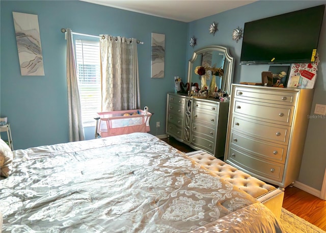 bedroom featuring hardwood / wood-style floors