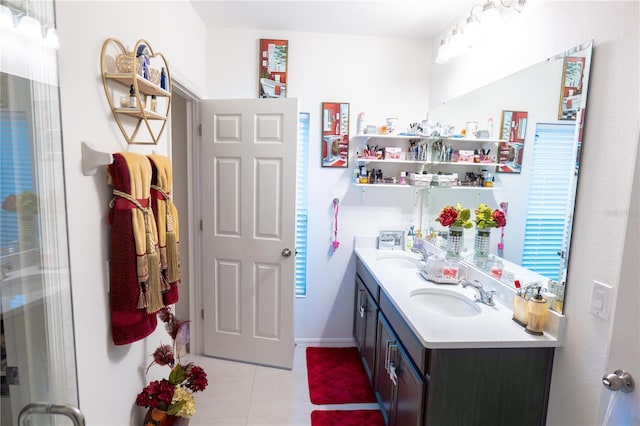 bathroom with tile patterned flooring and vanity