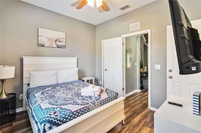 bedroom featuring dark hardwood / wood-style flooring and ceiling fan