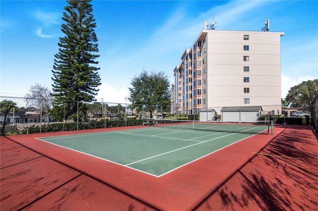 view of sport court featuring basketball hoop