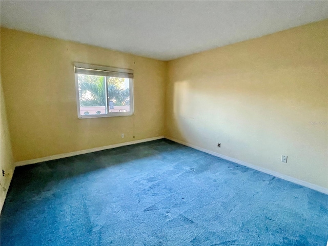 empty room featuring carpet flooring