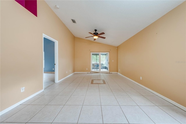 tiled spare room featuring ceiling fan and lofted ceiling