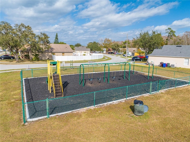 view of jungle gym featuring a yard