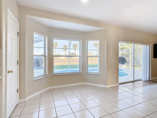 interior space with light tile patterned floors