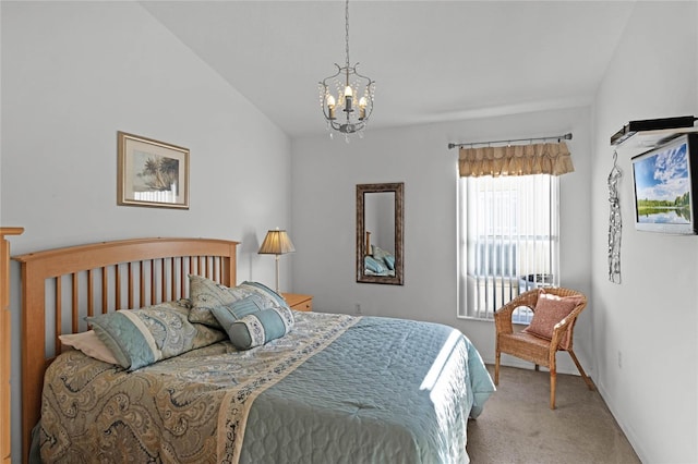 bedroom featuring light carpet, vaulted ceiling, and a notable chandelier