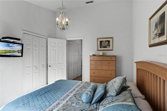 bedroom with an inviting chandelier