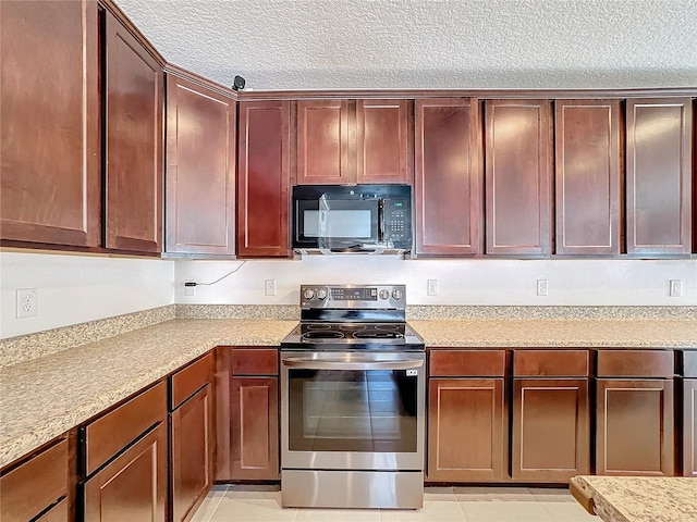 kitchen featuring a textured ceiling, light tile patterned floors, and stainless steel range with electric stovetop