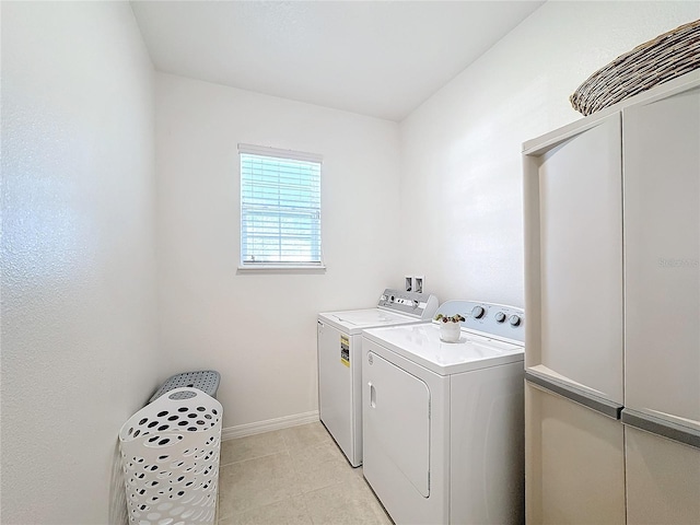 laundry area with washing machine and dryer