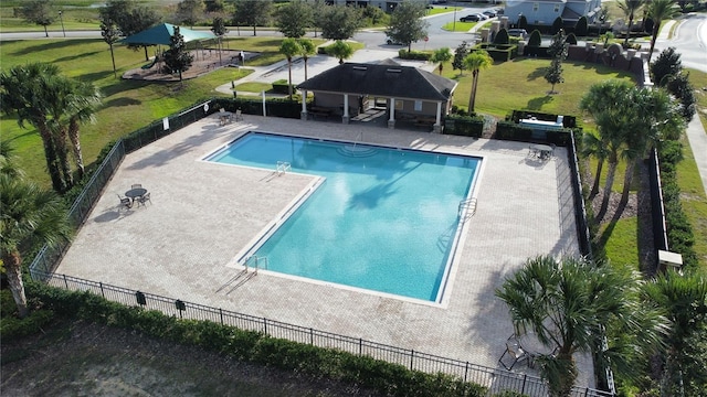 view of swimming pool with a patio area