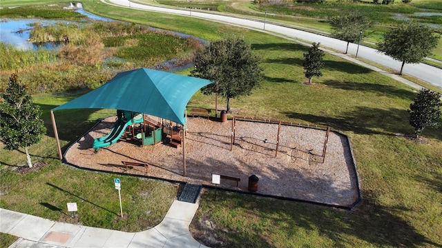 birds eye view of property featuring a water view