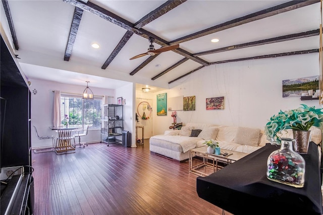 living room with vaulted ceiling with beams, ceiling fan, and dark hardwood / wood-style flooring