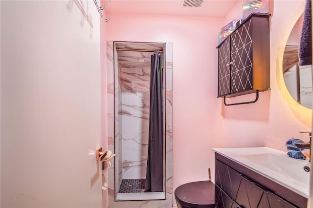 bathroom featuring vanity and walk in shower