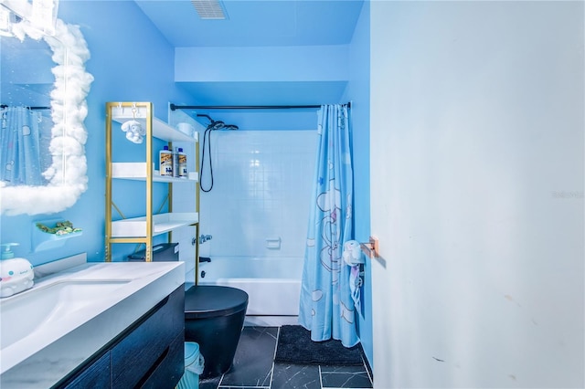 full bathroom featuring shower / bath combo, vanity, and toilet