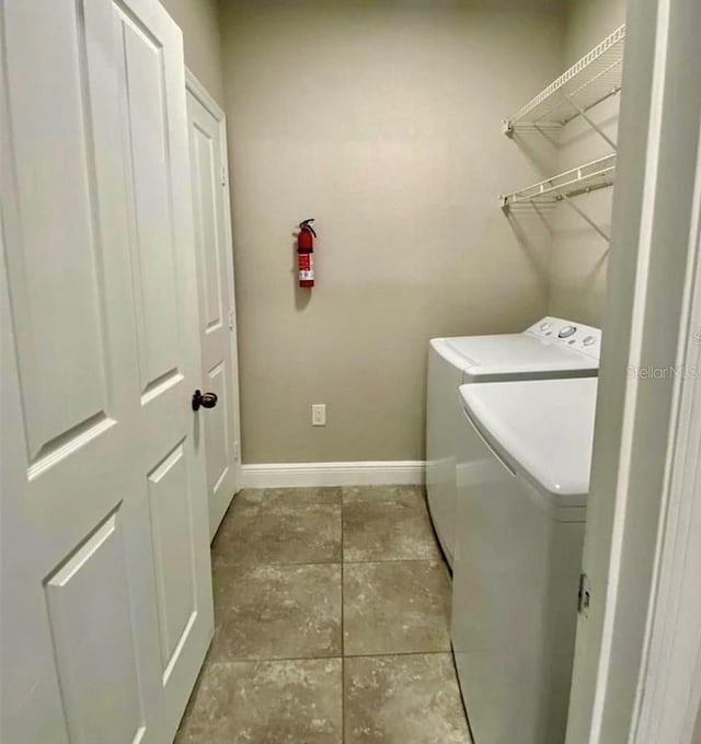 laundry area featuring independent washer and dryer