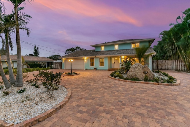 view of front of property with a garage