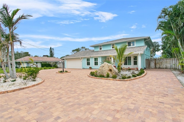 view of front of property featuring a garage