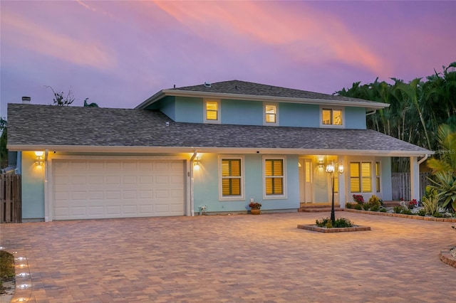 view of front of property featuring a garage