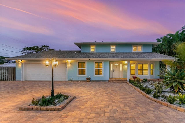 view of front of property featuring a garage