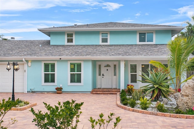 front of property featuring a garage