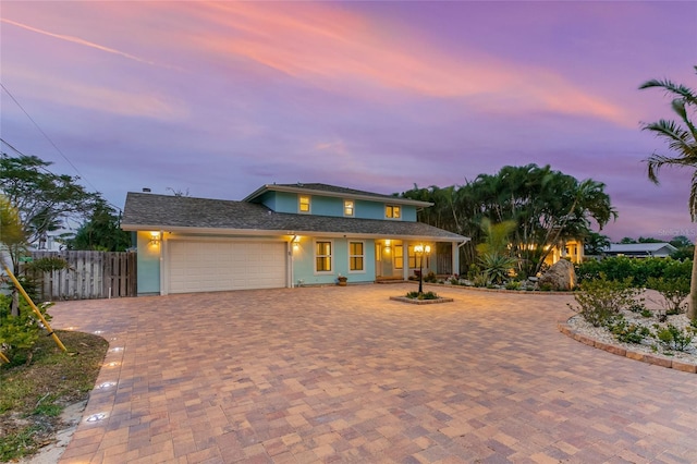 view of front of property with a garage