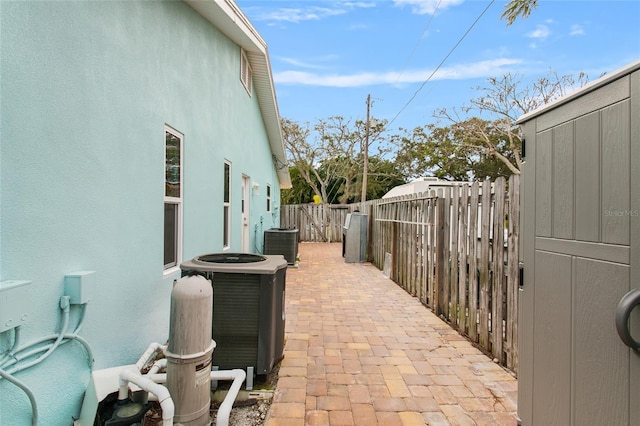 view of patio with central air condition unit