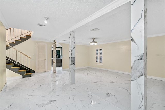 interior space featuring crown molding and a textured ceiling