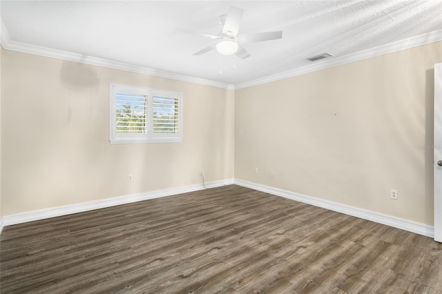 empty room with dark wood-type flooring, ceiling fan, and ornamental molding