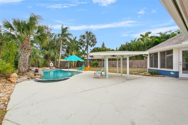 view of swimming pool with a patio area