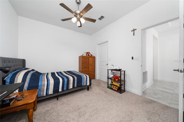 carpeted bedroom featuring ceiling fan