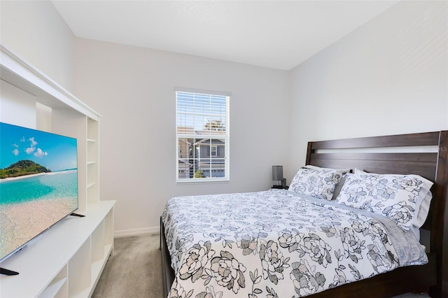 carpeted bedroom with baseboards