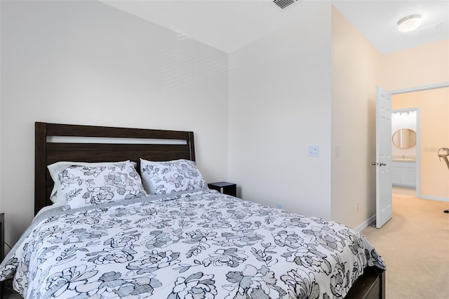 bedroom featuring carpet flooring and baseboards