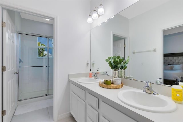 bathroom with vanity, tile patterned floors, and walk in shower