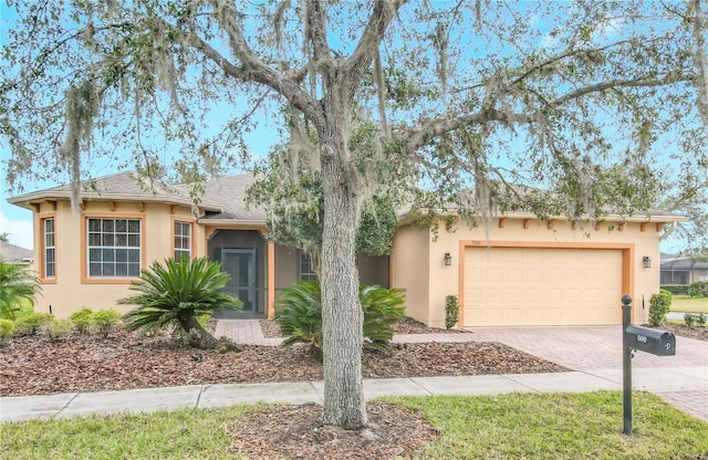 view of front of home with a garage