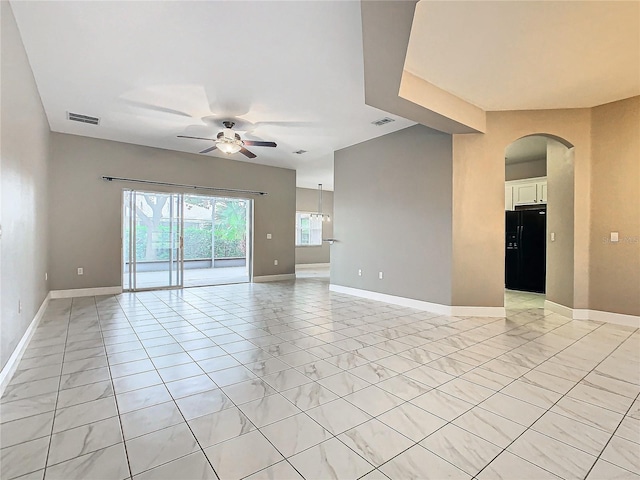 unfurnished room with ceiling fan