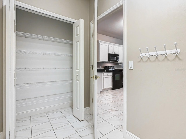 interior space featuring light tile patterned floors