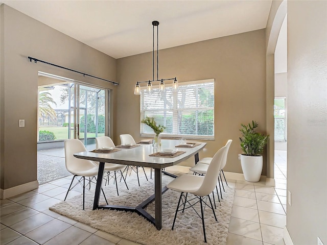 dining room featuring light tile patterned flooring