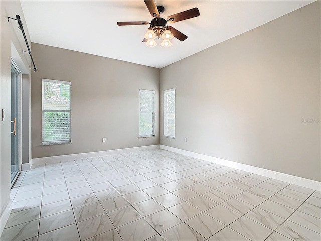 spare room featuring ceiling fan