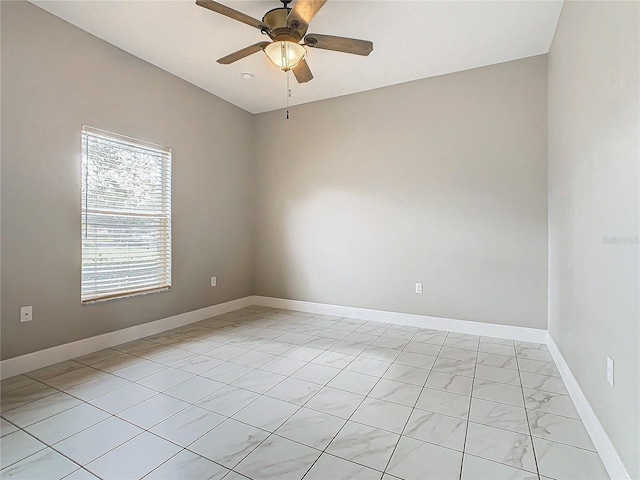 empty room featuring ceiling fan